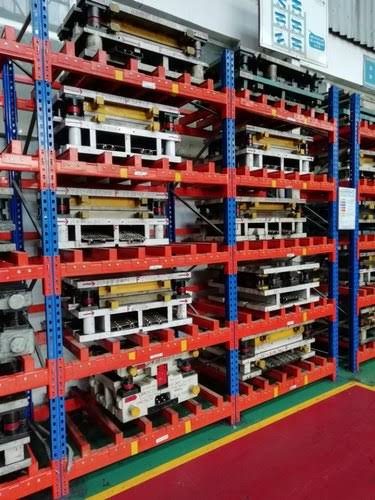 Die storage rack loaded with tooling