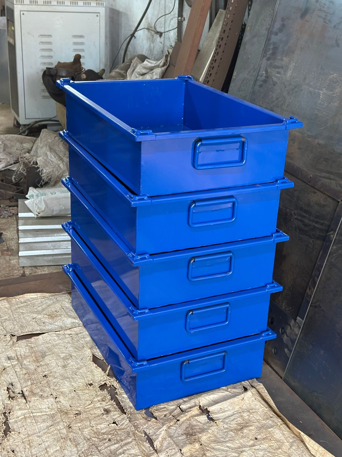 Large blue stackable metal trays