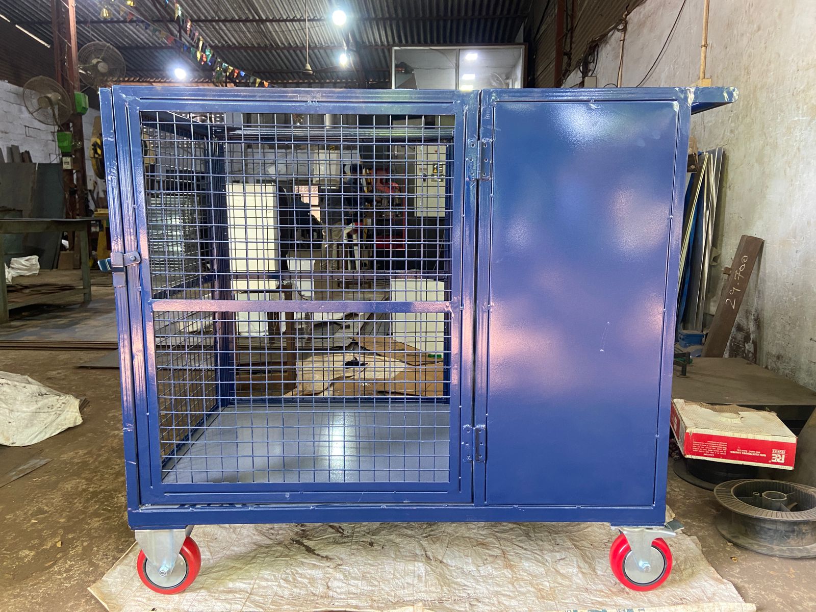 Mesh-sided material handling trolley